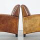 Set of 2 characterful, comfortable armchairs made of sheepskin leather with a sleek Art Deco design