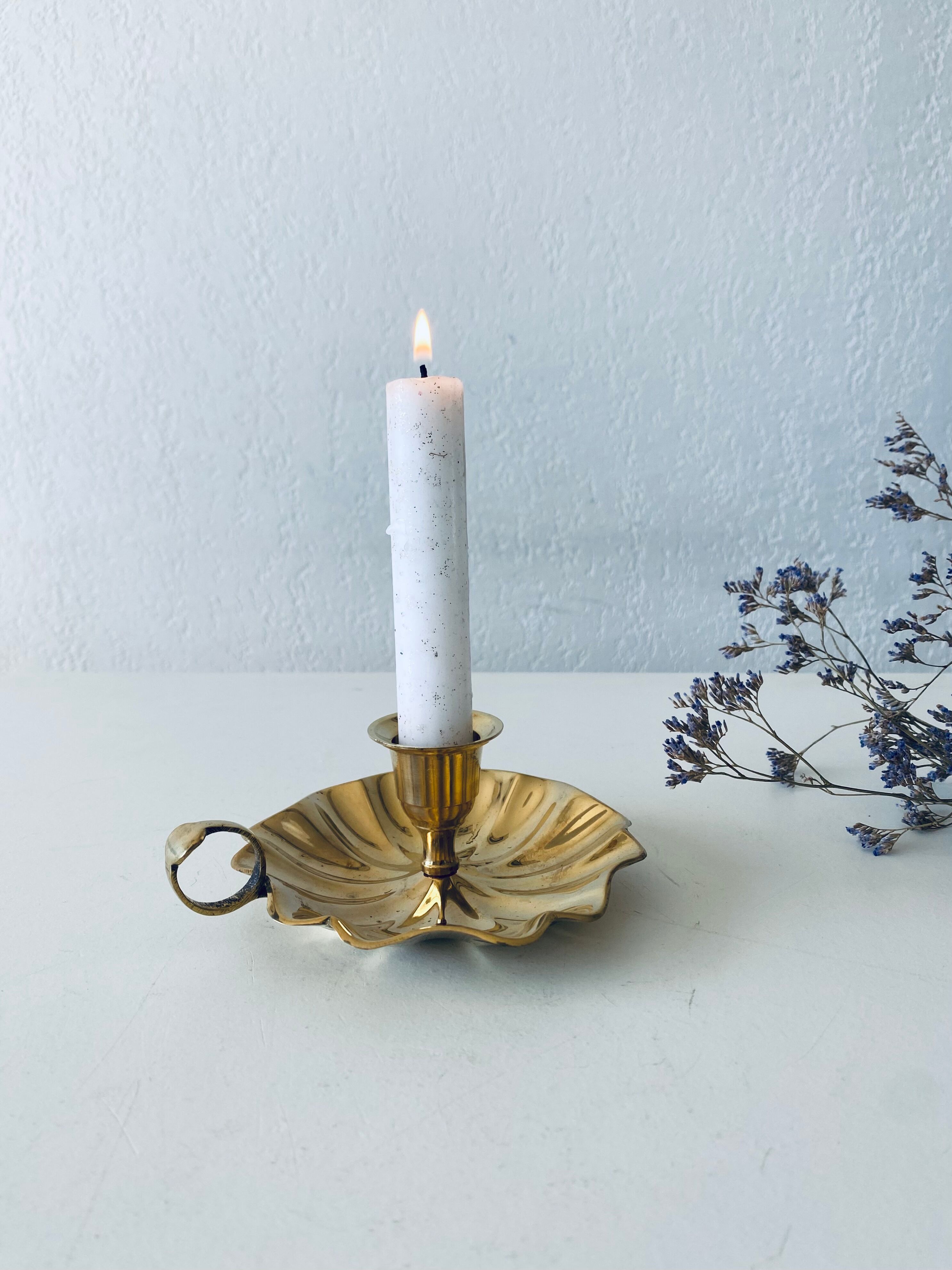 Indian candle holder in golden brass