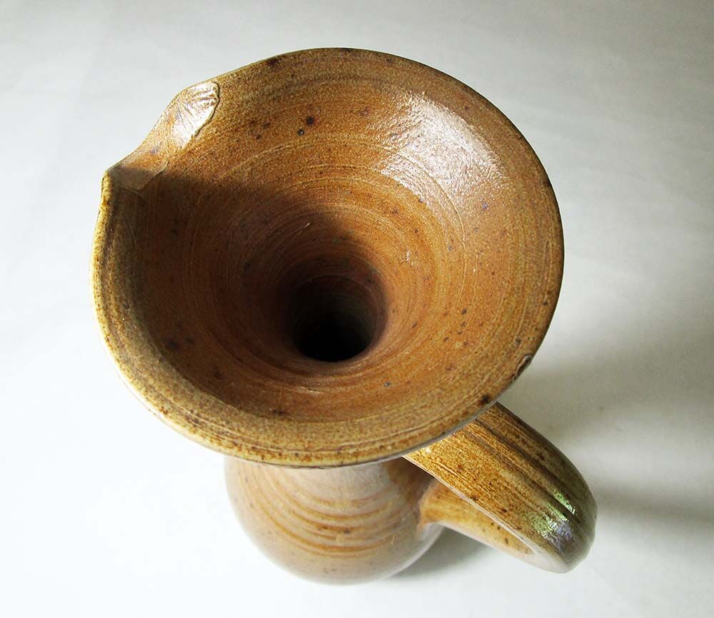 Elongated sandstone vase
