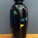 Black glass vase with red, green, blue and yellow details 1960s