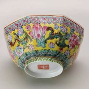Vintage porcelain bowl decorated with dragons and flowers, China, 1980s.