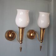 Pair of gold metal and white opaline wall sconces, wall light, sconce.