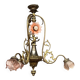 Renaissance chandelier with putti statuette.