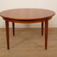 Vintage round dining table | extendable | teak | 125 - 185 cm