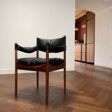 Chair with armrests by Kristian Solmer Vedel