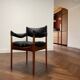 Chair with armrests by Kristian Solmer Vedel