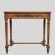 Louis XVI style walnut table with a drawer from the late 19th century.