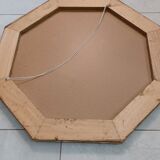 Octagonal mirror with golden wood frame