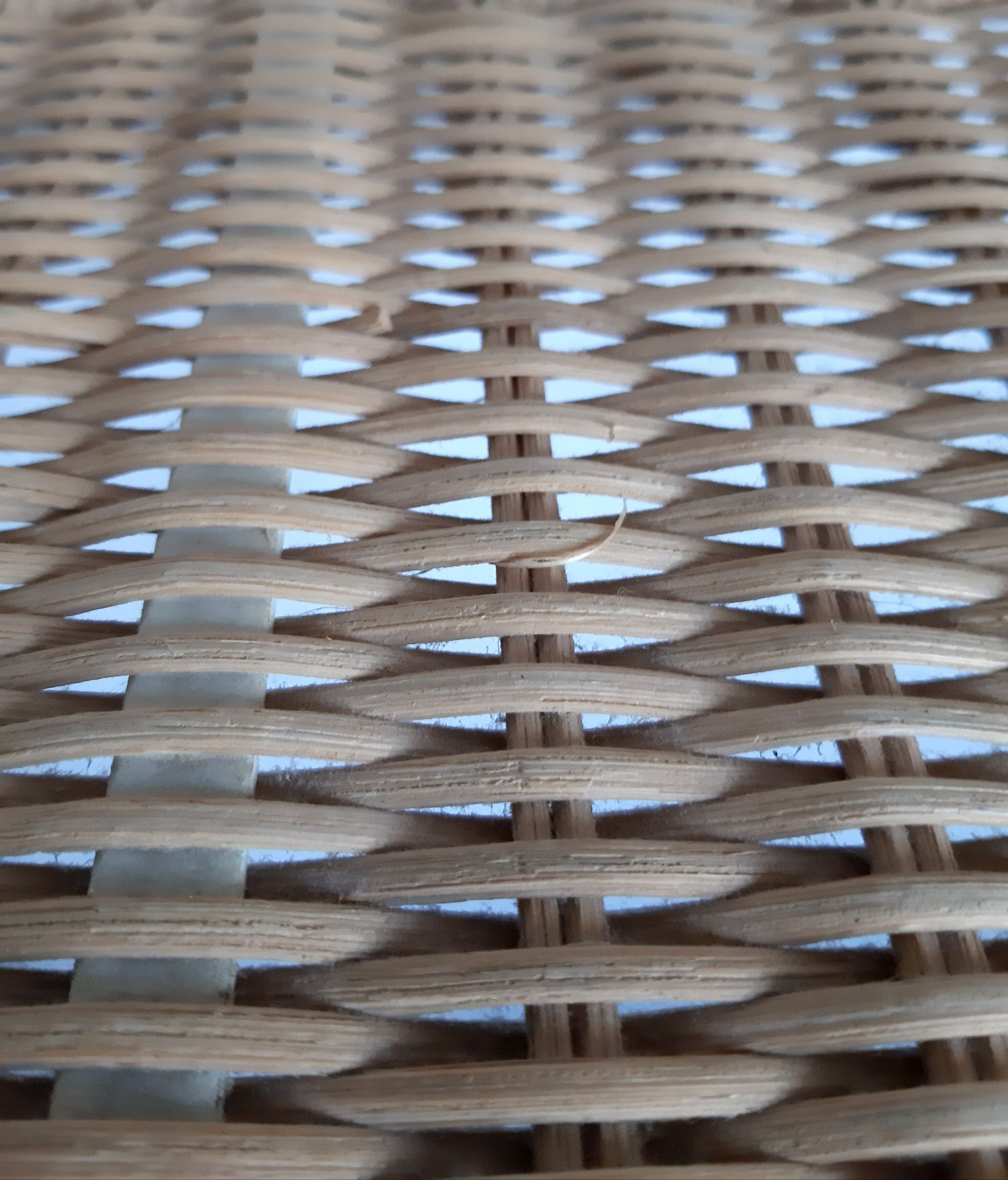 Rattan shelf and wrought iron