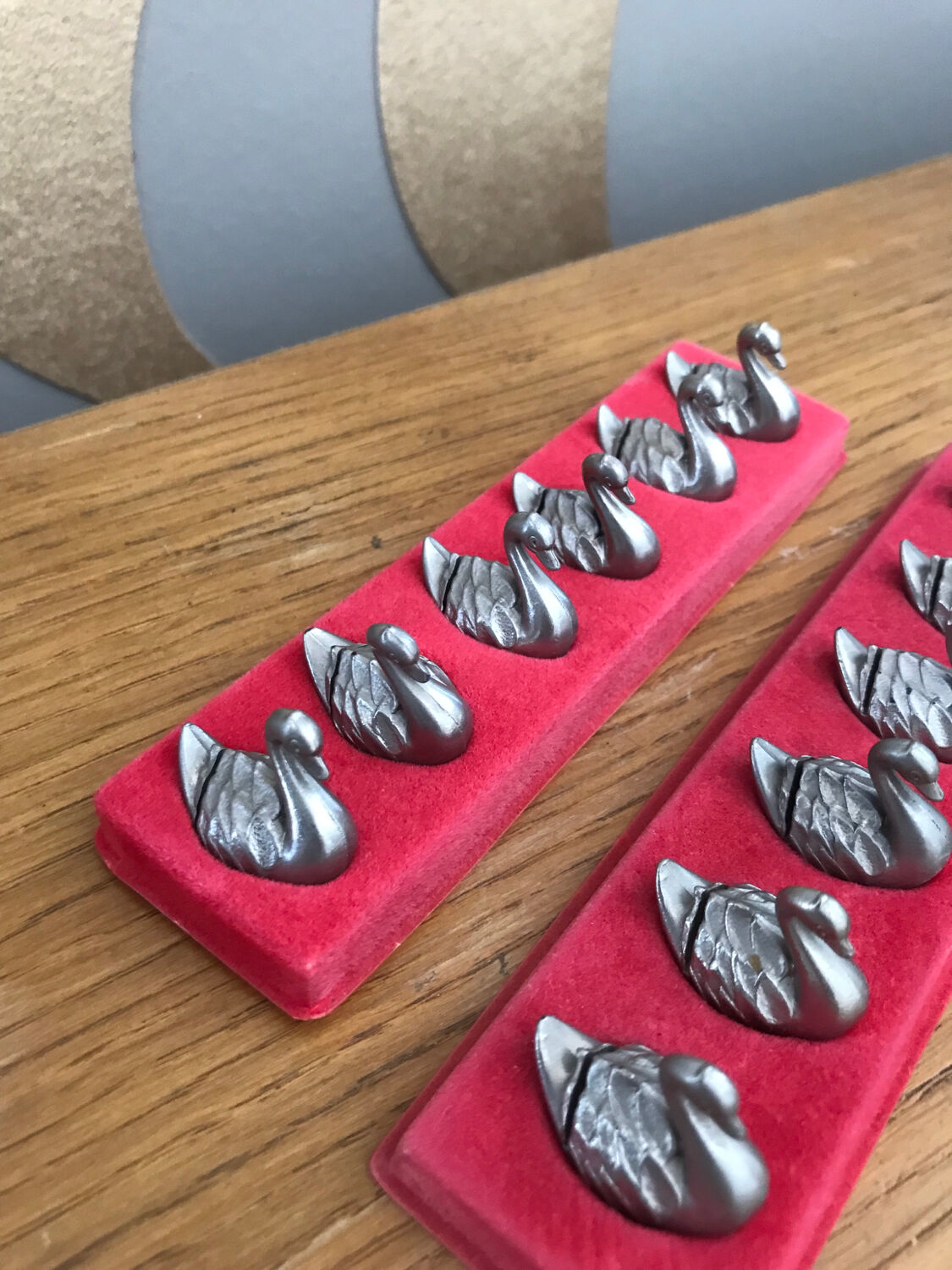 Thirteen metal swan named holder