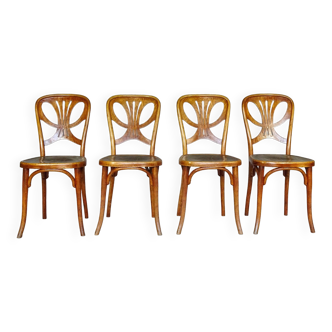 Lot de 4 chaises THONET N°642, vers 1910 assise "pivoine et oiseau"