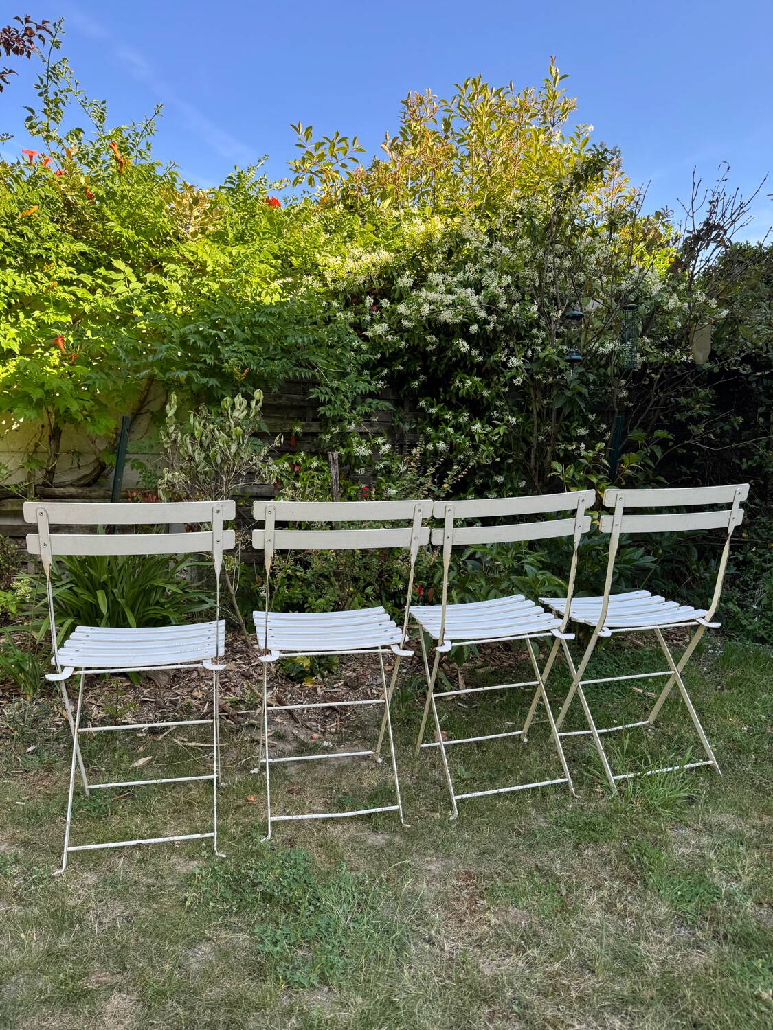 Set of 4 vintage folding chairs in metal and wood