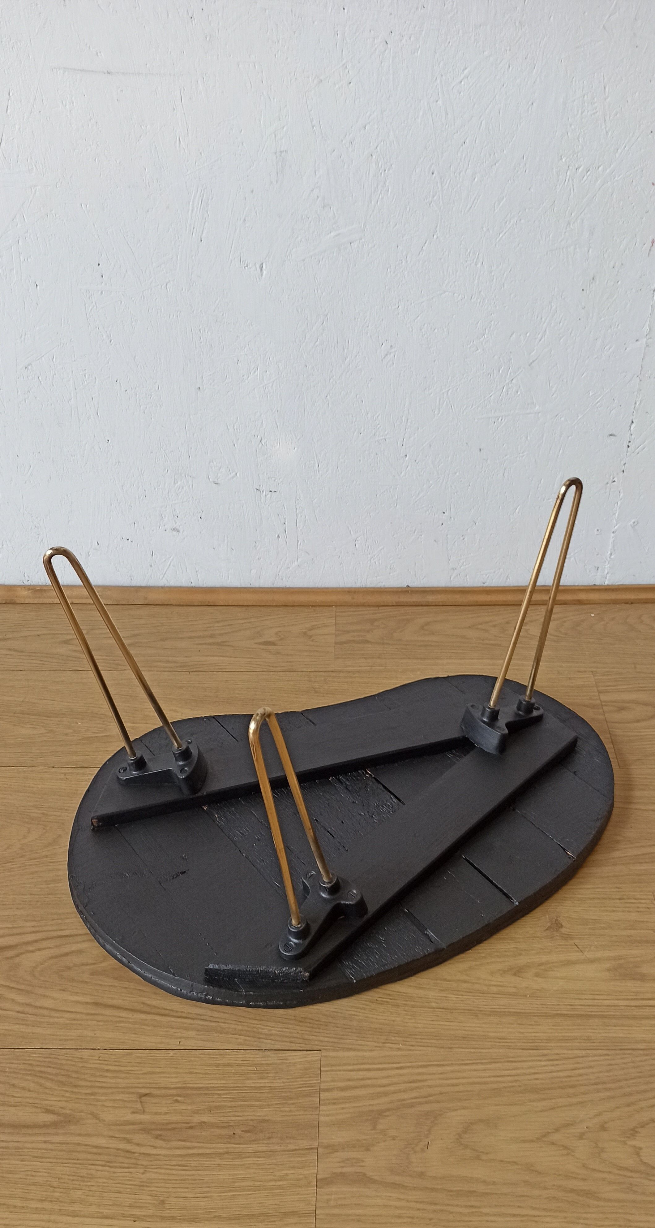 Unusual coffee table on three legs