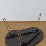 Unusual coffee table on three legs
