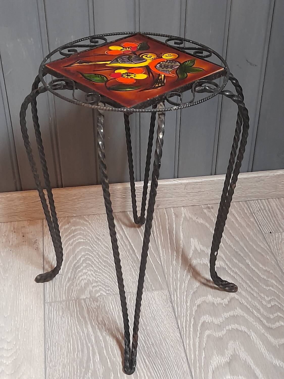 Wrought iron stool and Vallauris pottery signed Leduc.