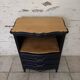Chiffonnier en bois brut et peint en noir