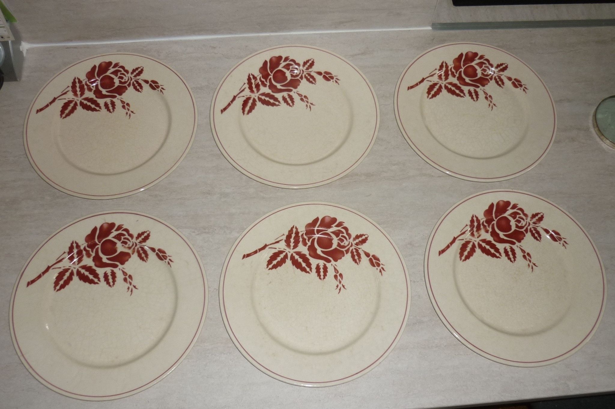 Set of 6 old flat plates in beige and red earthenware
