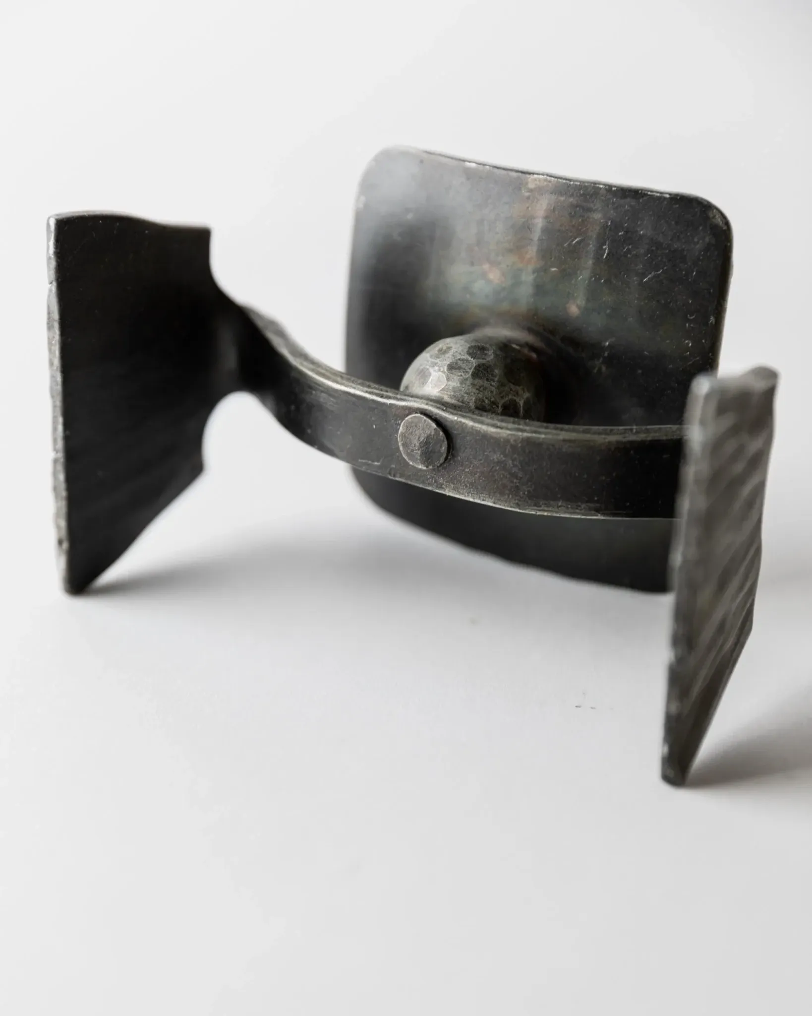 Vintage brutalist iron candlestick from the 1970s.