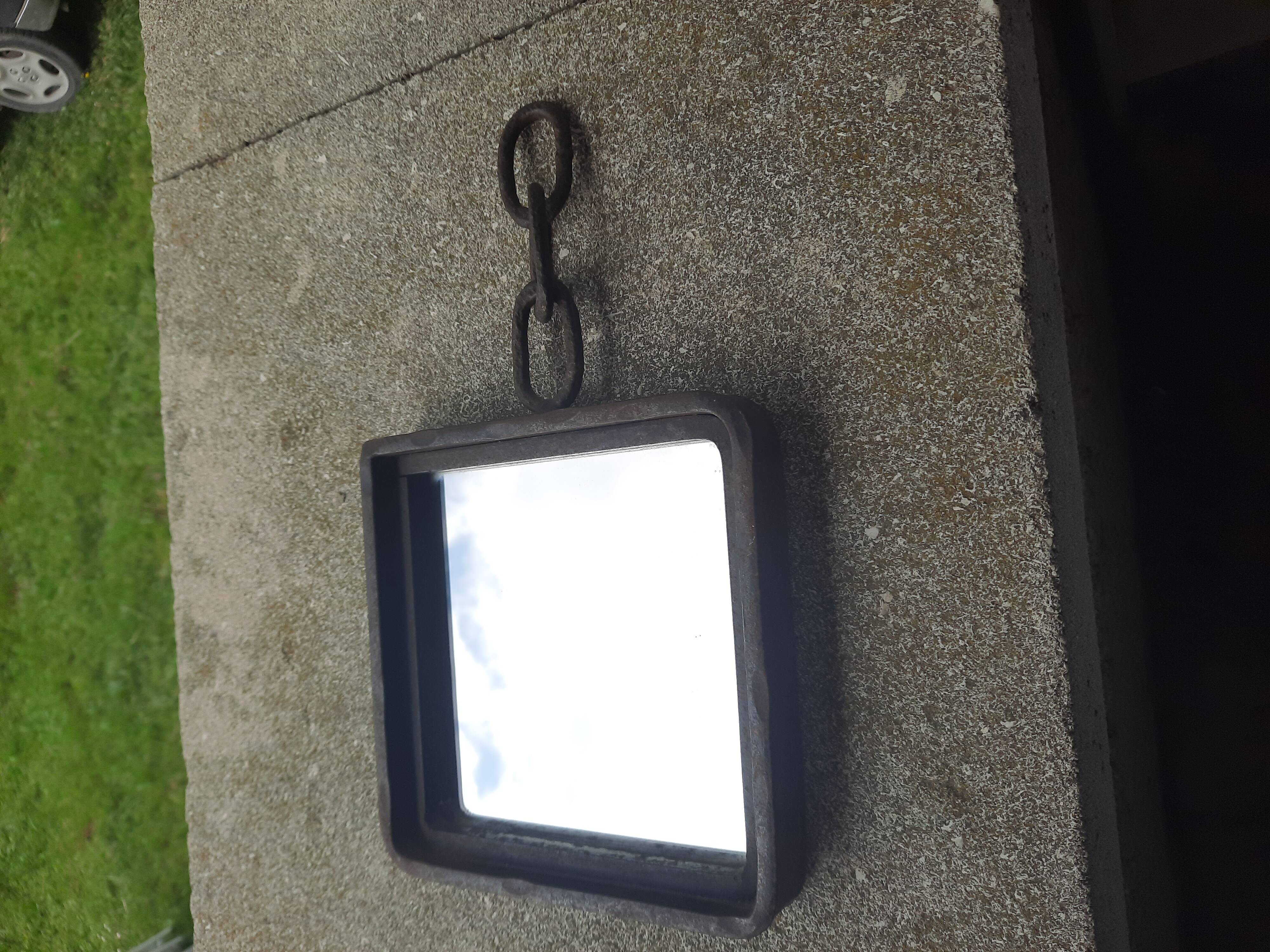 Brutalist cast iron mirror