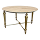 Brass coffee table with a white marble top.