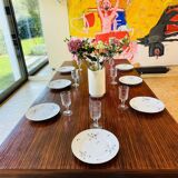 Desk that can serve as a dining table.