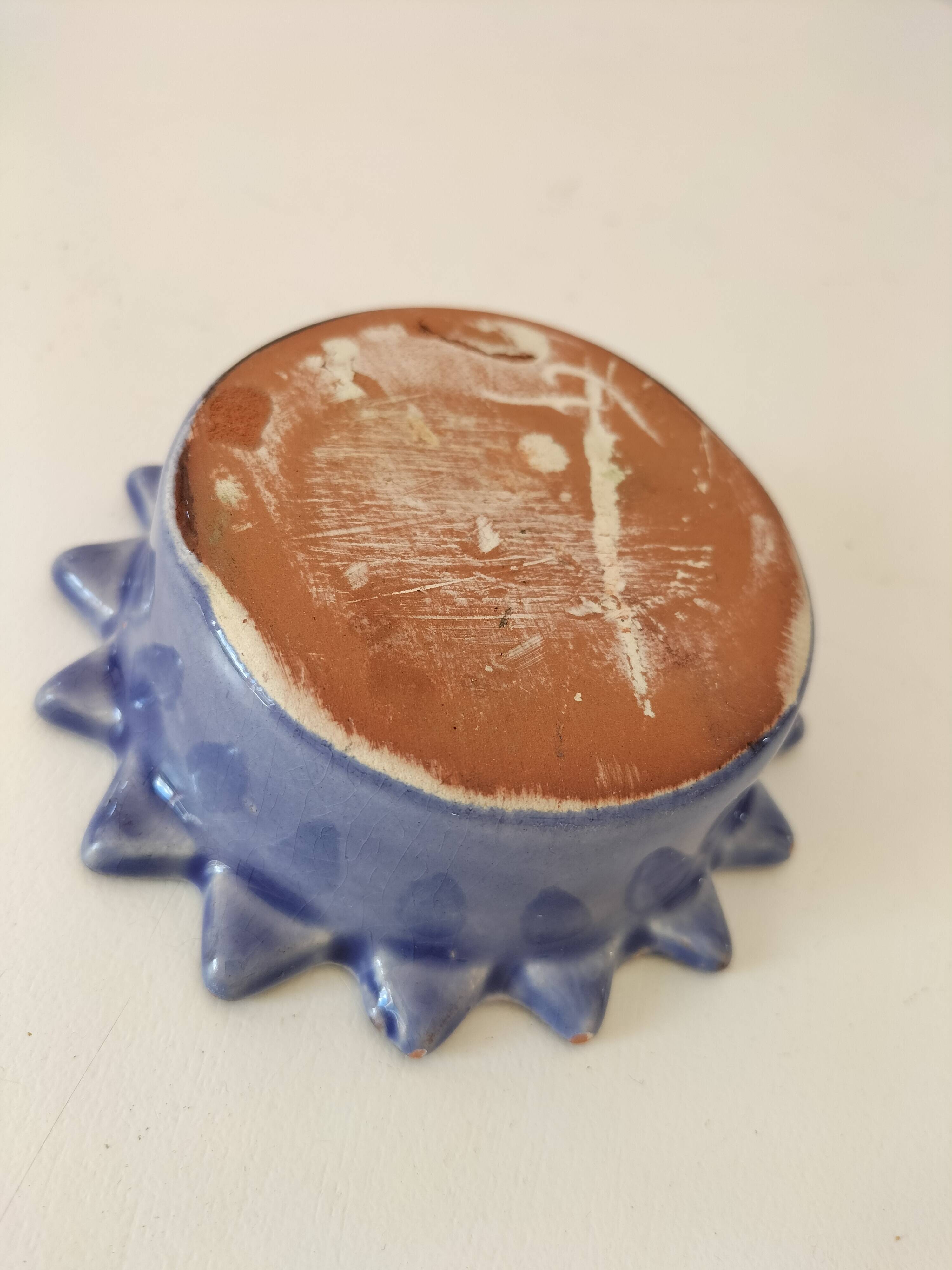 Handcrafted blue earthenware pocket emptier