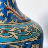 Iznic ceramic vase with blue interlacing