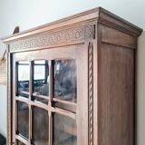 Old glass-fronted library in solid wood