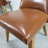 8 brown skai chairs 1950