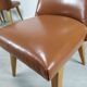 8 brown skai chairs 1950