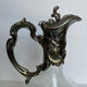 Glass decanter and silver metal frame