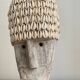 Wabi sabi face mask in aged wood and cowrie shells