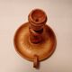 Vintage candlestick holder crafted from turned pine wood Scandinavian-style