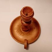Vintage candlestick holder crafted from turned pine wood Scandinavian-style