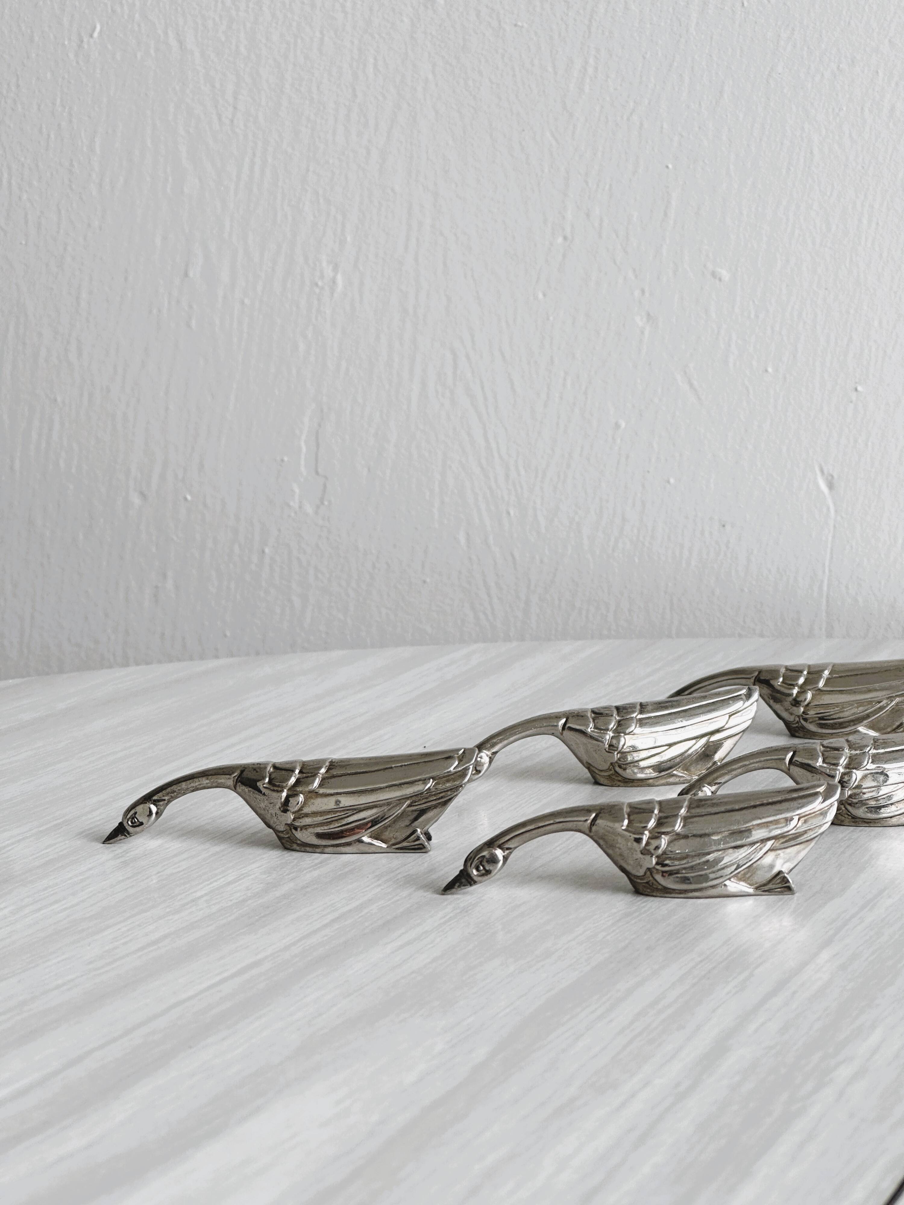 Set of 5 antique goose-shaped knife rests