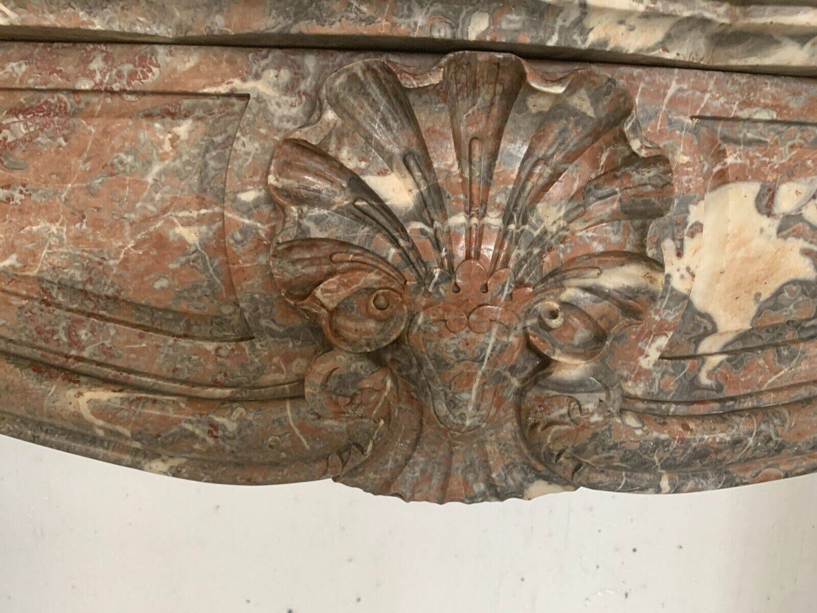 Louis XV style fireplace in red breche marble 19th century