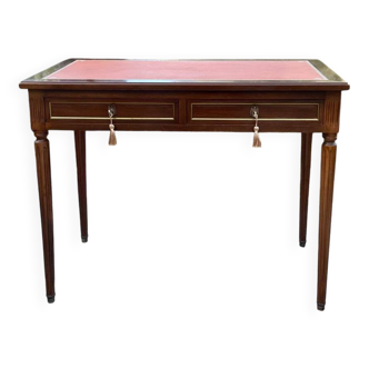 Flat desk in mahogany in the Louis XVI style.