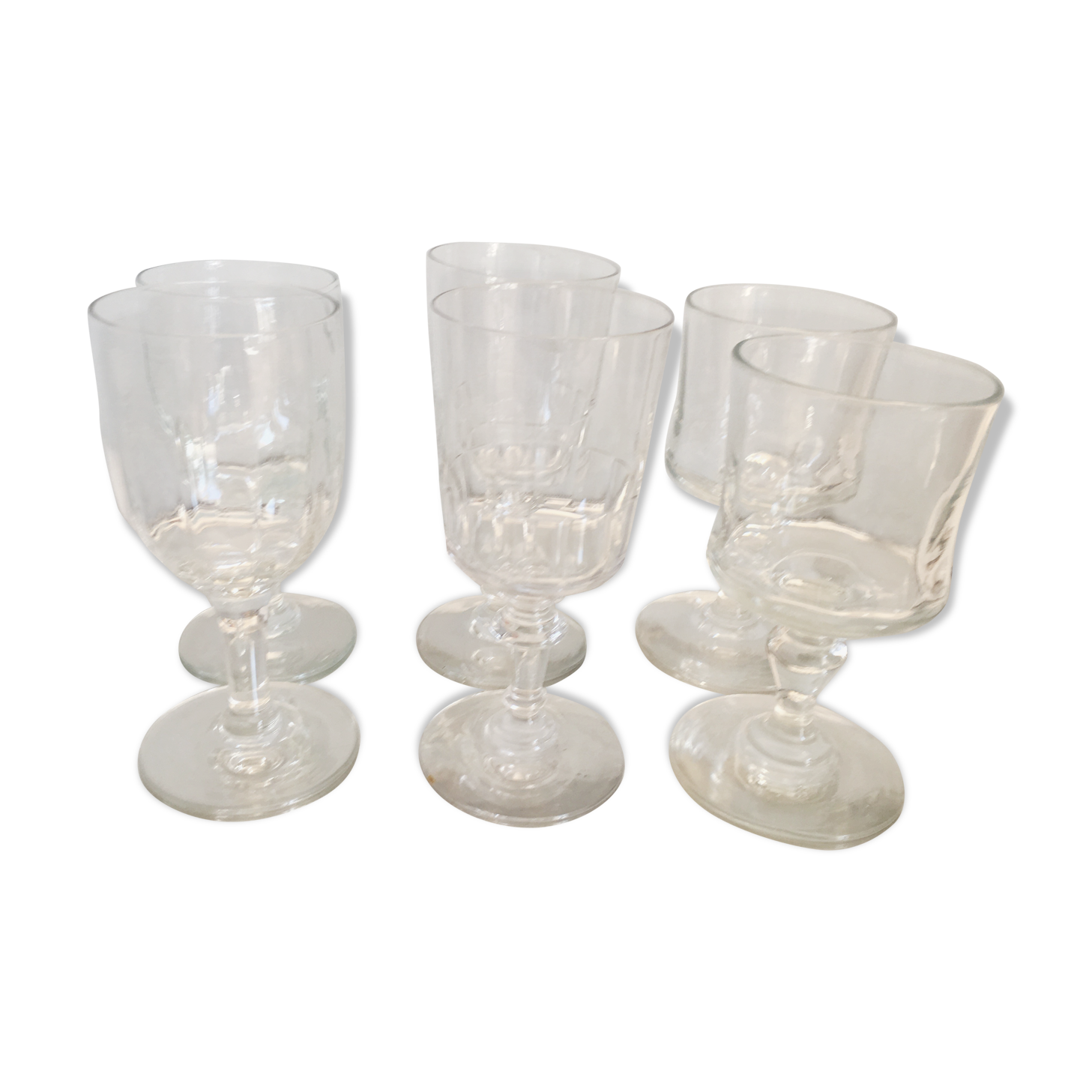 6 old mismatched water glasses