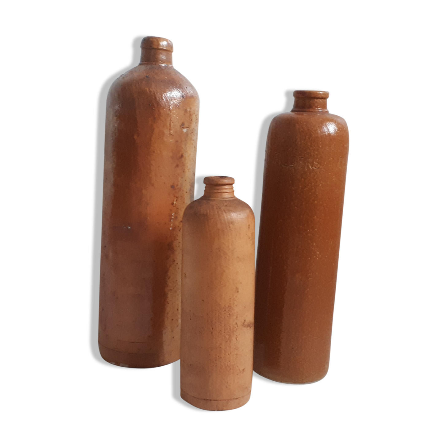 Trio of sandstone bottles 3