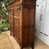 Spanish furniture with carved wood profiles and coats of arms from the 1950s.