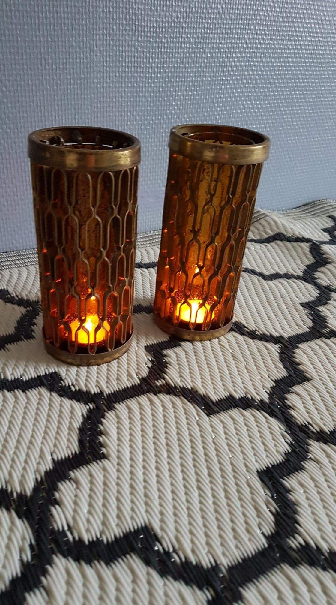Photophores moucharabieh style candlesticks in brass and orange bubbled glass