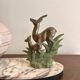 Antique Art Deco table lamp in marble and pink glass featuring a deer.