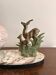 Antique Art Deco table lamp in marble and pink glass featuring a deer.