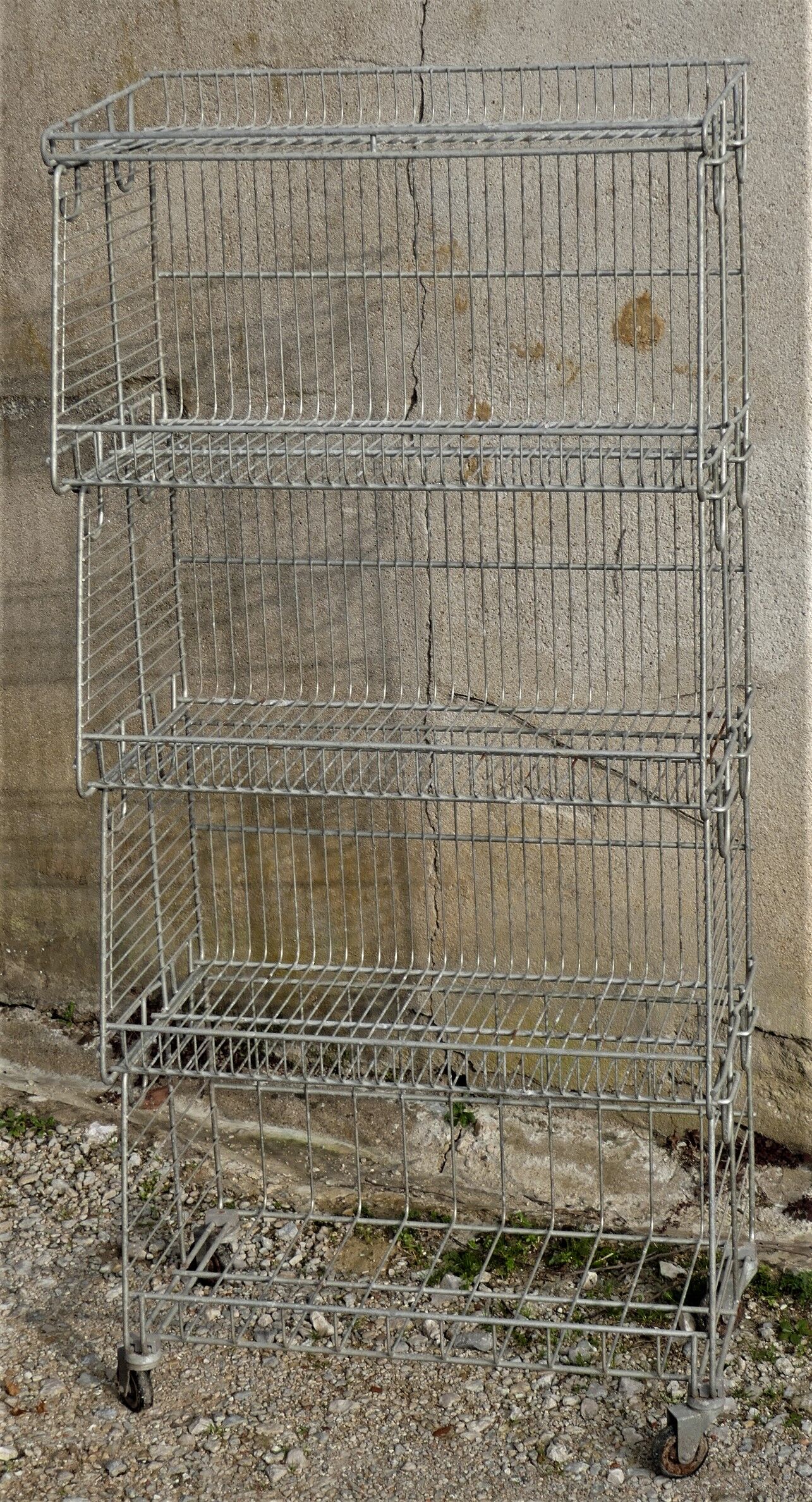 Rolling vintage store metal shelf
