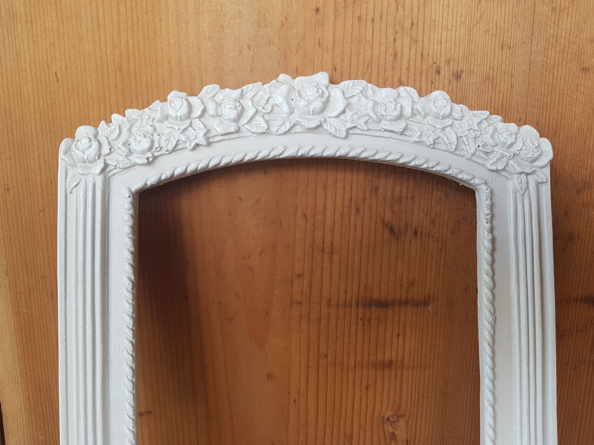 Frame decorated flowers patinated