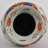 19th century Imari porcelain baluster vase with dragon relief decoration