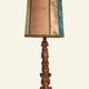 Renaissance table lamp in polychrome carved wood with cherubs.