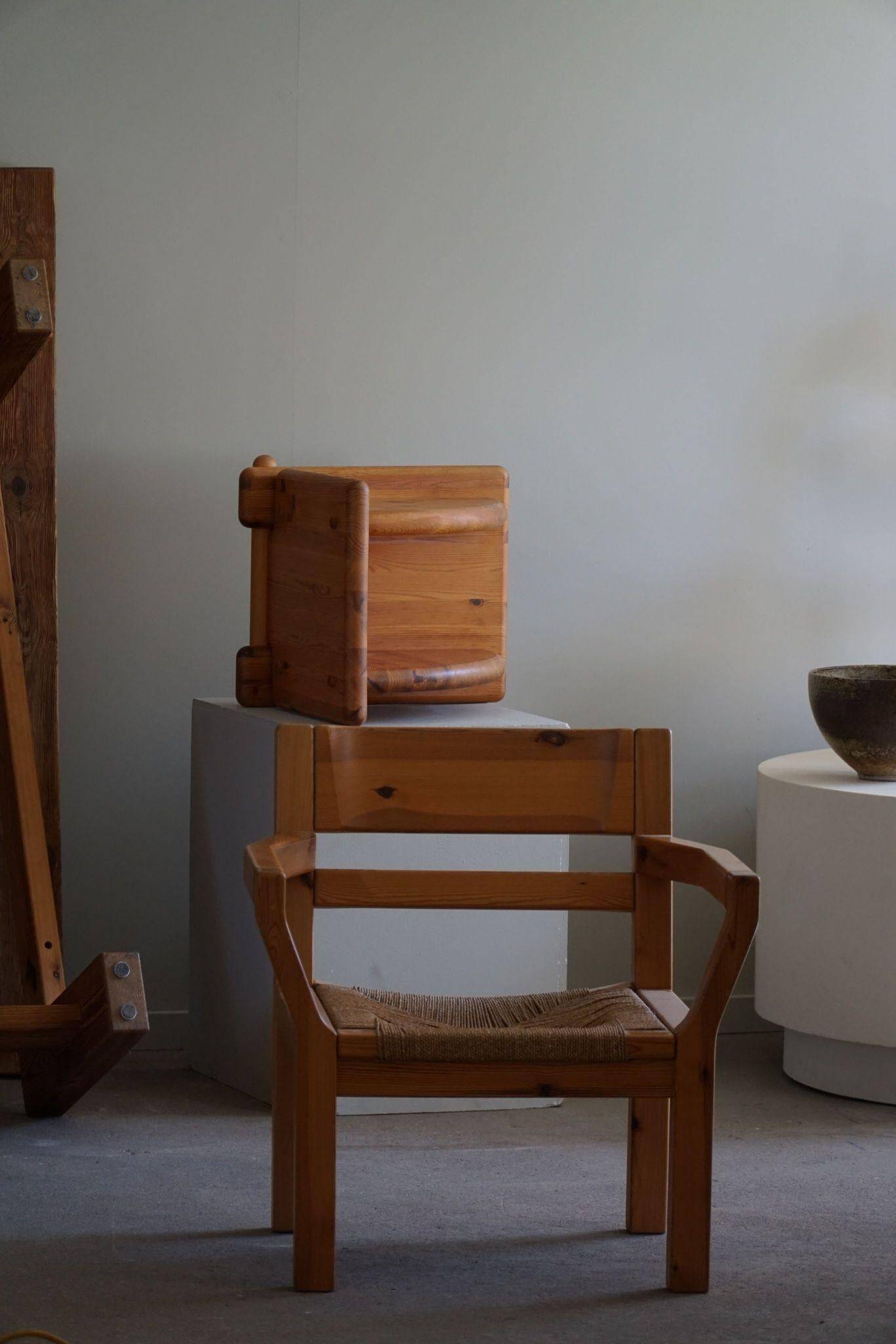 Tage Poulsen, a pair of brutalist chairs in pine and cord, Danish modern style, 1970s.