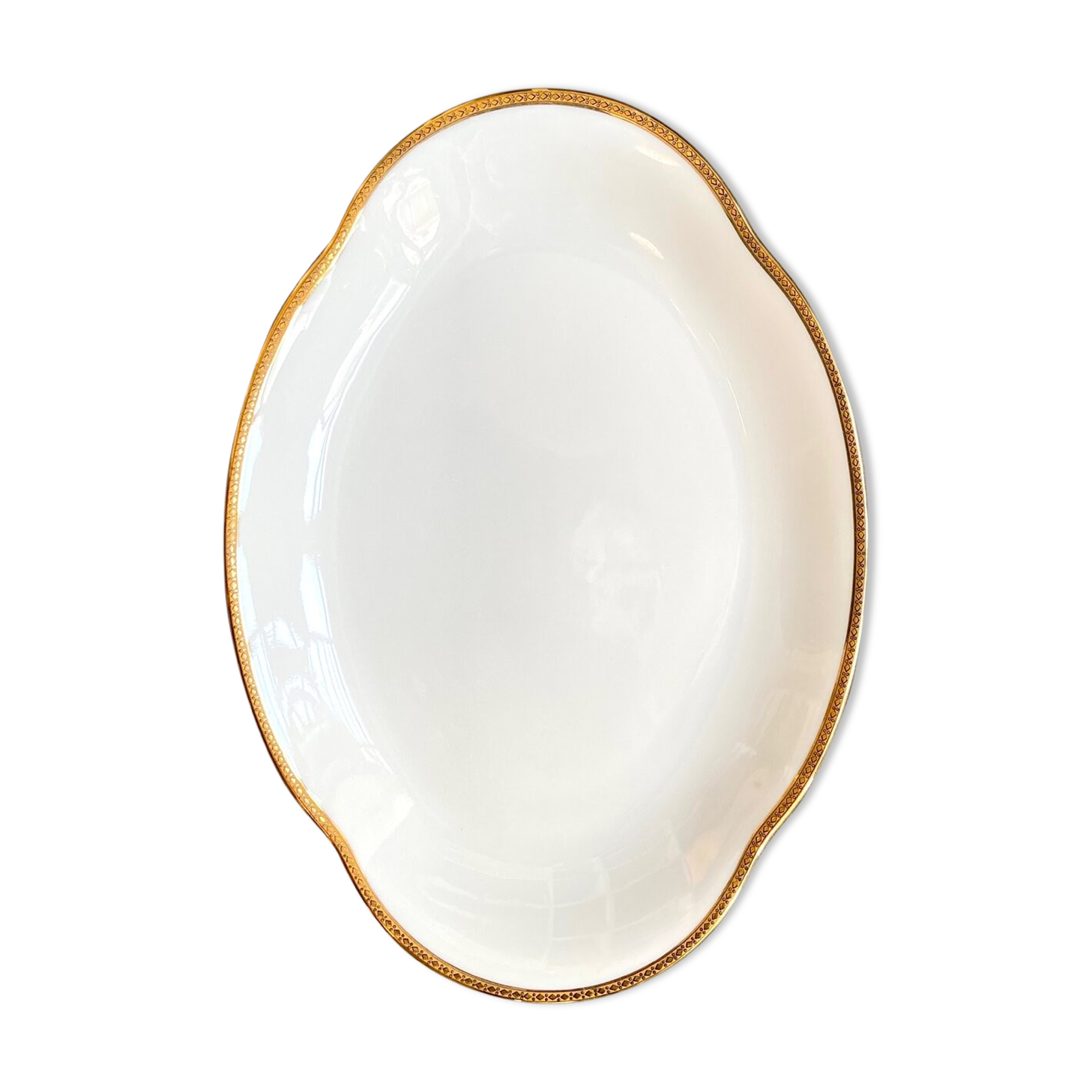 Oval dish in white and golden Limoges porcelain