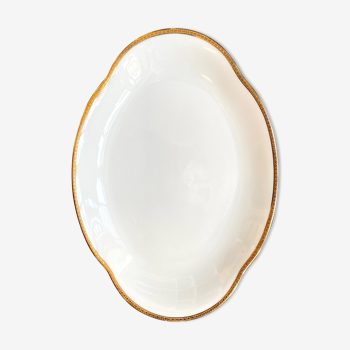 Plat ovale en porcelaine de Limoges blanche et dorée